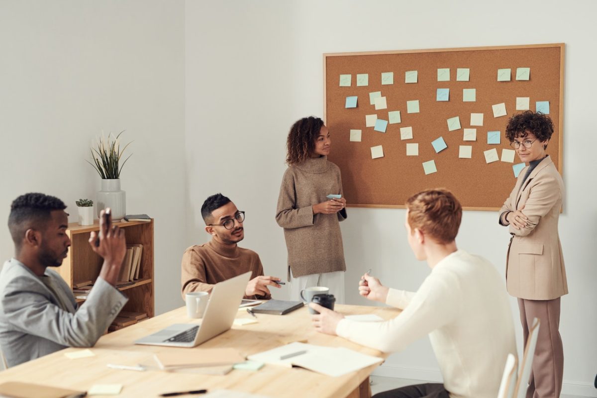 people in a meeting/Starting a Research Company